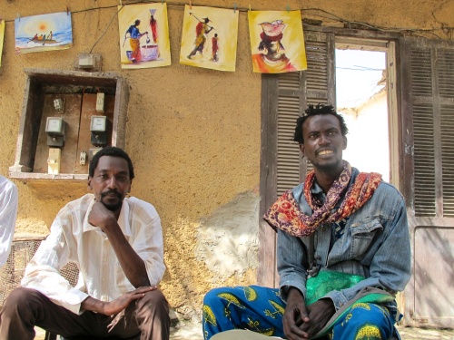 Abdou Sall and Babacar Traoré Doli, Director General and Artistic Director of the Saxalart Festvial in Médina, Dakar. Image (c) Robin Riskin